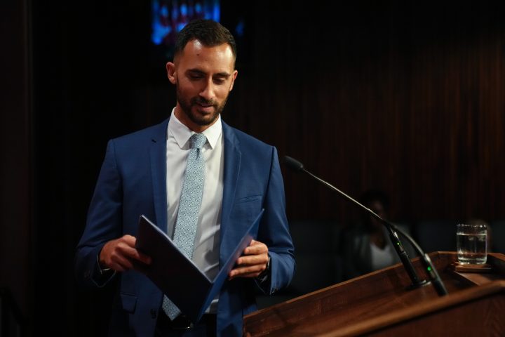 Ontario Education Minister Stephen Lecce steps to the podium before speaking to journalists at the Queen's Park Legislature in Toronto on Friday Aug. 25, 2023.