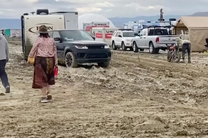 Burning Man attendees face difficult exodus from muddy Nevada desert