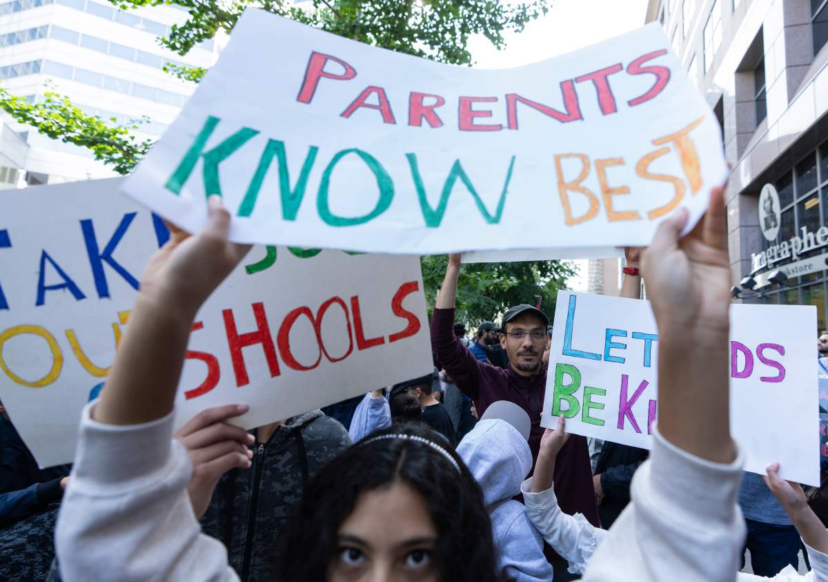 Protesters demonstrate against sexual orientation and gender identity programs in schools, in Montreal, Wednesday, Sept. 20, 2023. The protest was one of many across Canada, organized by “1MillionMarch4Children,” as they protest against so-called “gender ideology” being taught in schools.