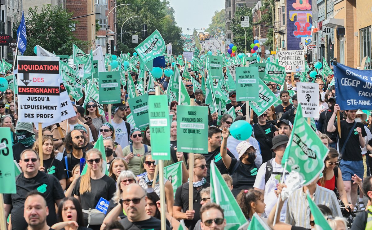 People take part in a public sector union demonstration in Montreal, Saturday, September 23, 2023. Unions representing Quebec public sector workers say they expect thousands of people to attend a demonstration in downtown Montreal today.