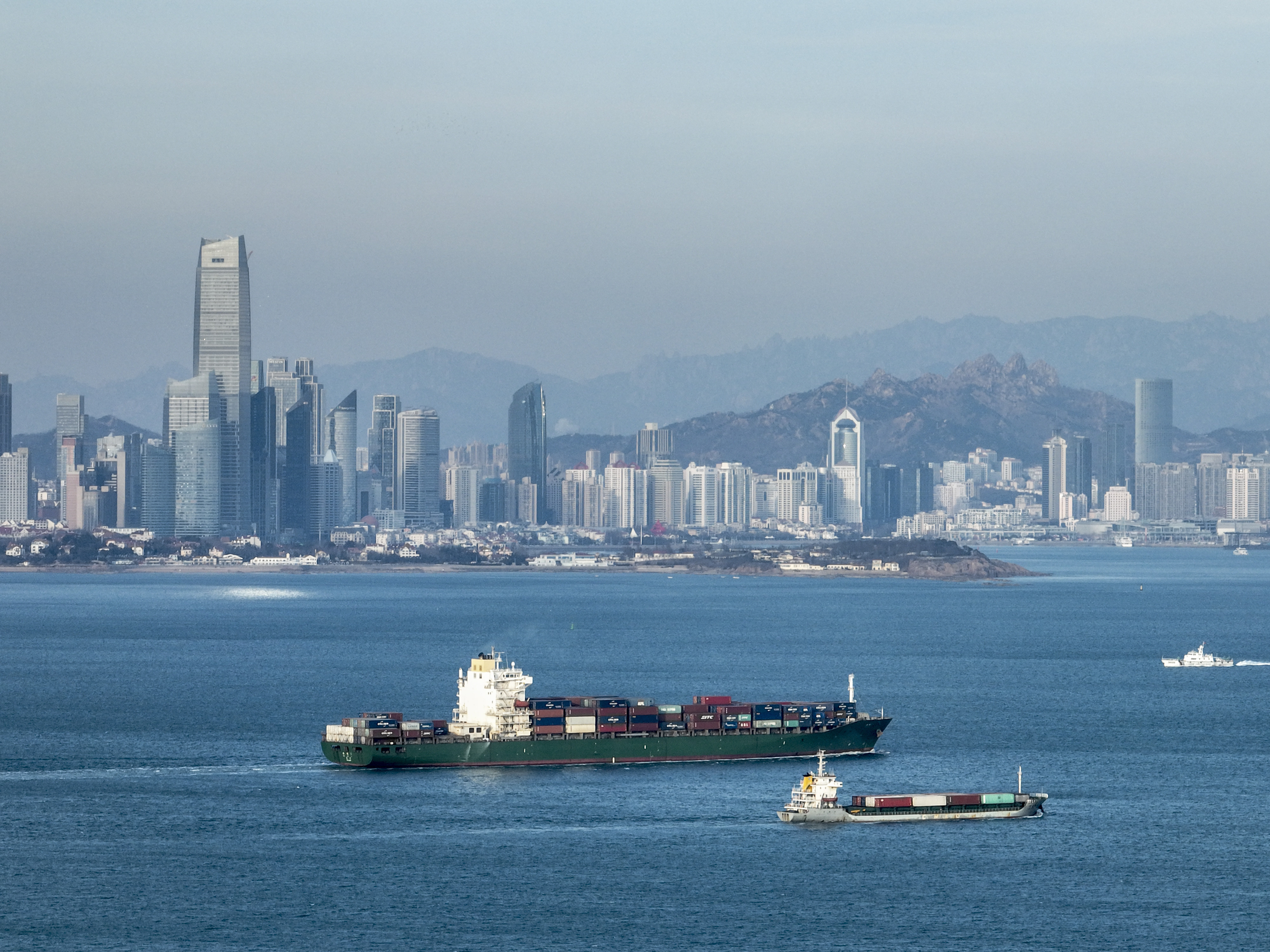 The port city of Qingdao, part of Shandong province, where Wei Hu was born. Credit Image: © Costfoto/DDP via ZUMA Press)