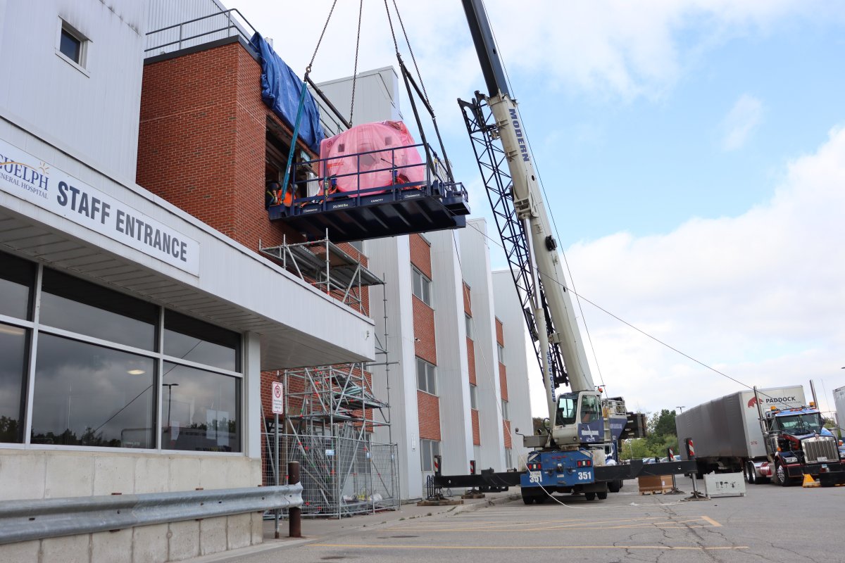Crane lifting the new MRI into Guelph General Hospital.