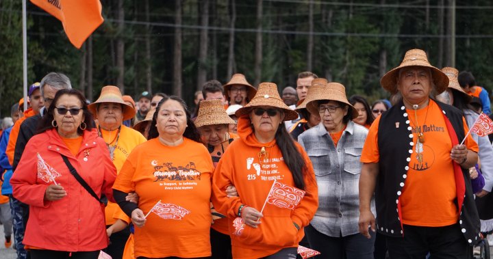 ‘I’m speaking for you now’: Haisla residential school survivors march for their ancestors