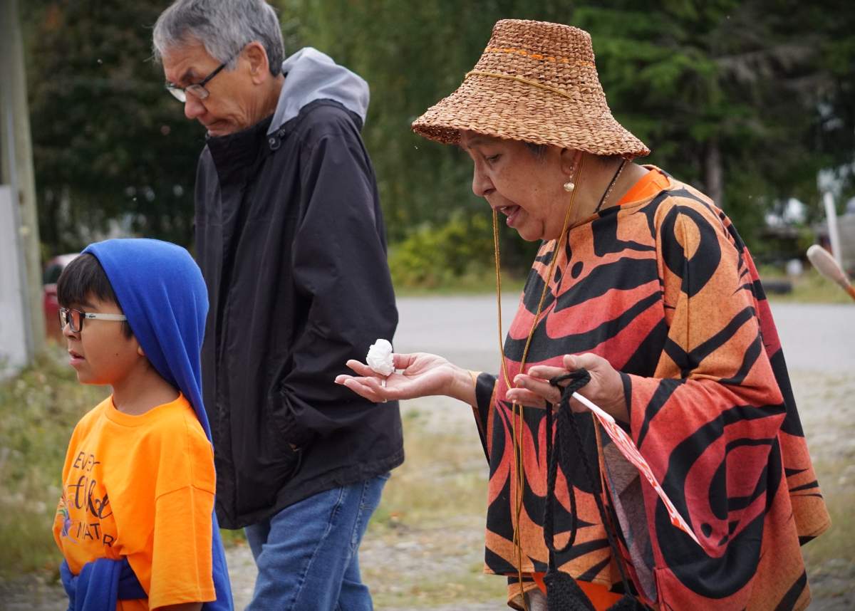 Residential school survivor Darleen Wilson marches on Truth and Reconciliation Day at the Haisla Nation in Kitimaat, B.C. on Sept. 30, 2023.