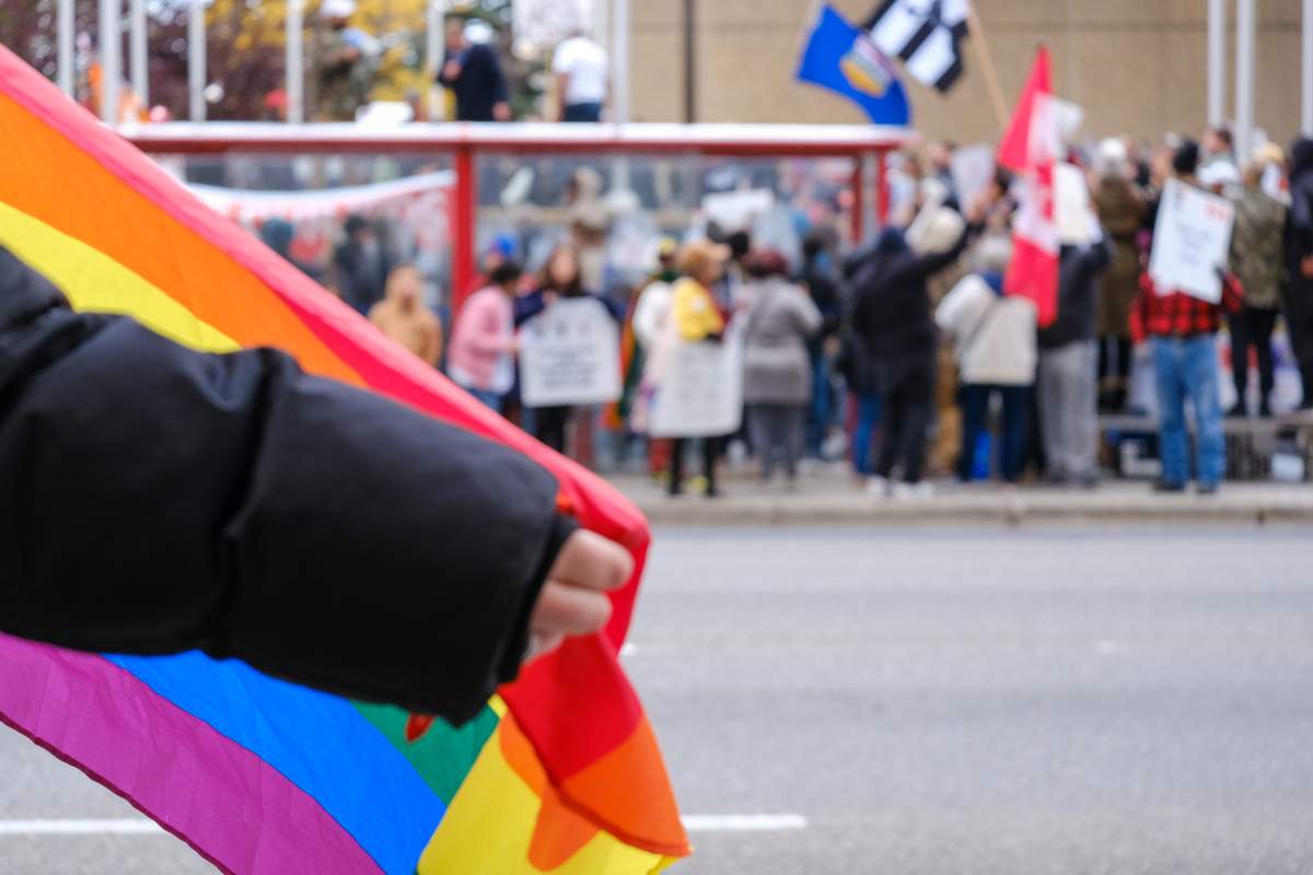 Protestors and counter-protestors demonstrate in Calgary on Sept. 20, 2023, over sexual orientation and gender identity education in schools.