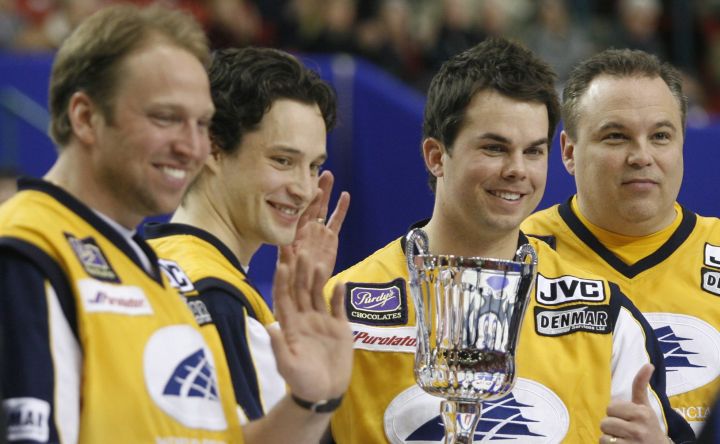 Lead Marcel Rocque, left to right, second Scott Pfeifer, David Nedohin, and skip Randy Ferbey celebrate after winning the 2006 Players Championship final in Calgary, Sunday, April 16, 2006. The team took home the $50,000 prize.
