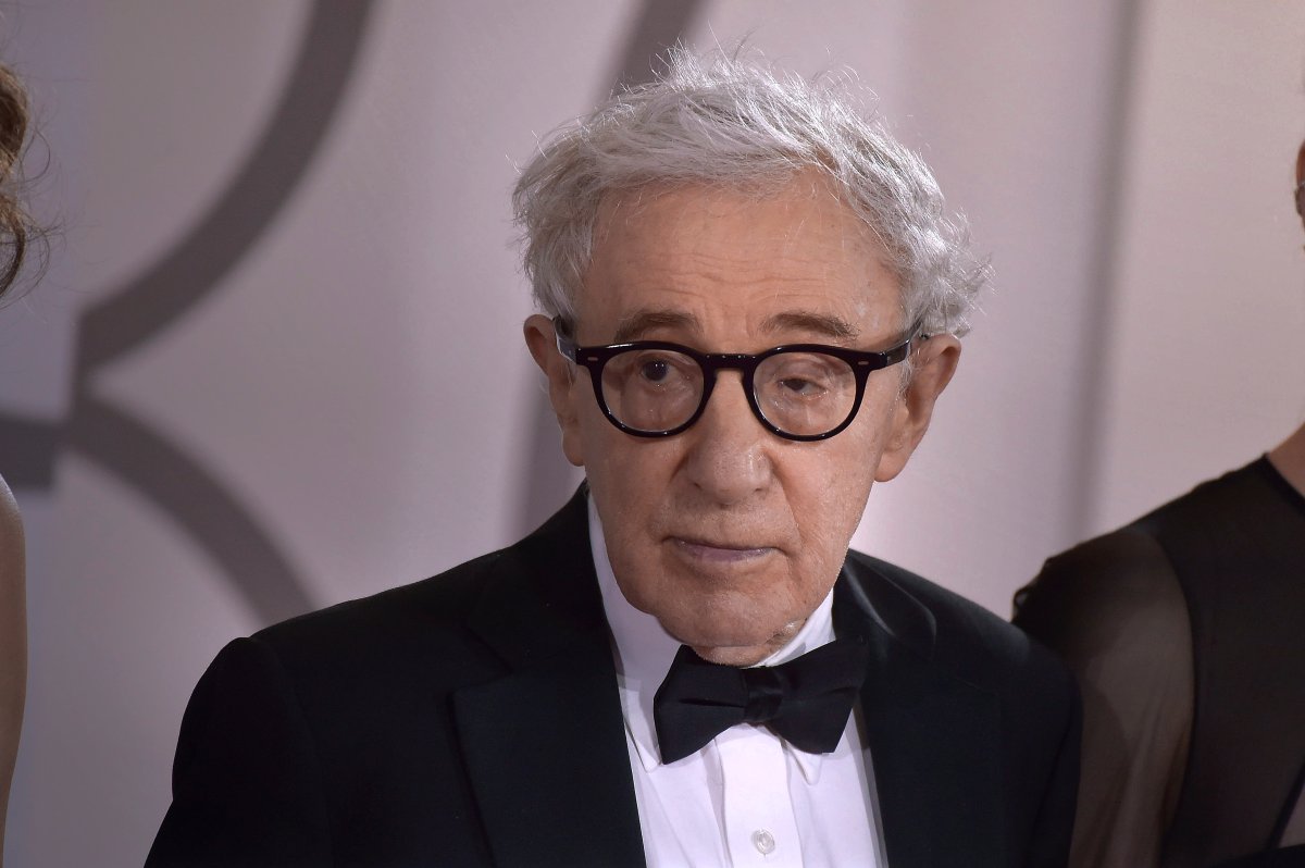 Woody Allen in a black suit and bowtie.