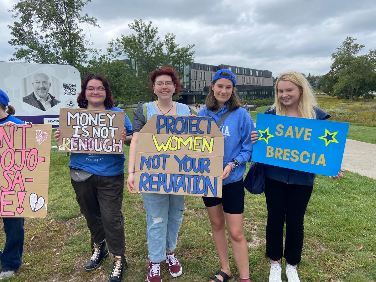 From left: Cassandra Pastavage, Emily Shervill, Kayla Tafvro, and Hayley Hamilton attending the rally at Brescia University College on Wednesday, Sept. 27, 2023.