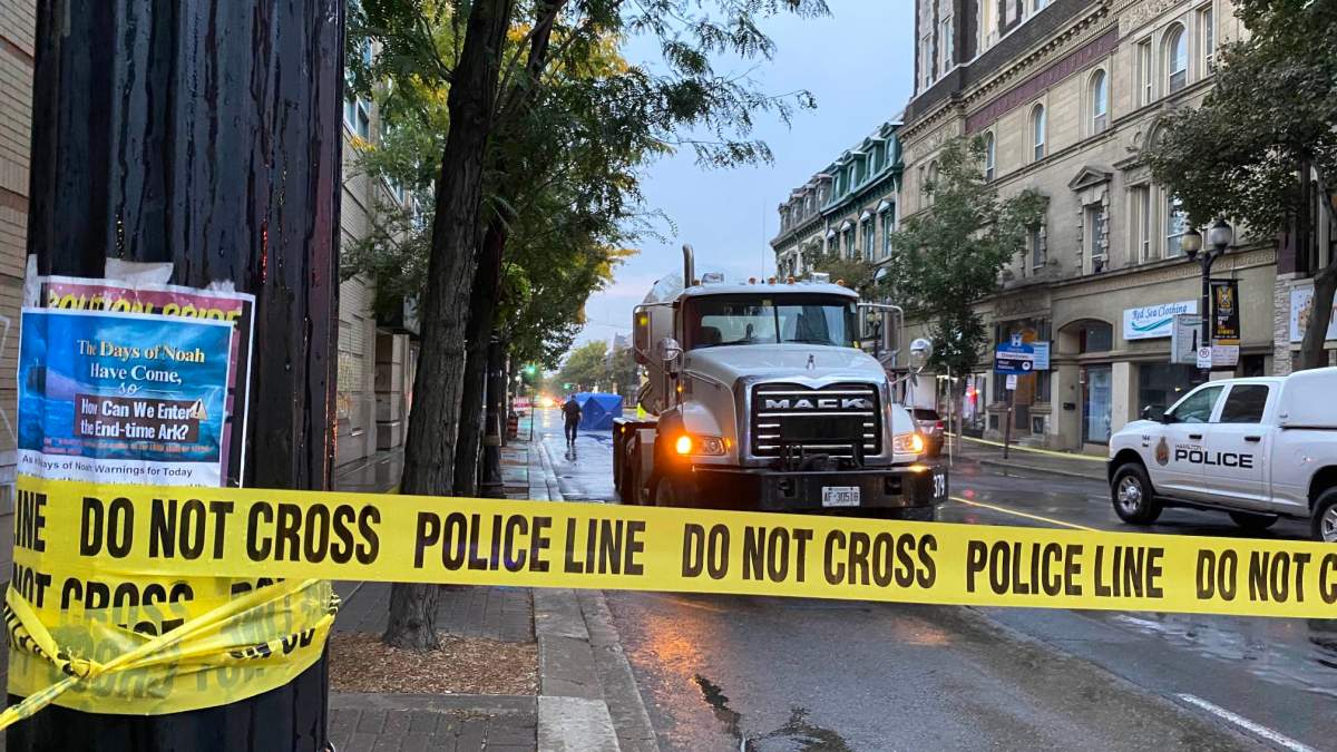 Hamilton police on scene at James Street North and York Boulevard on Sept. 28, 2023. Collision investigators say a cyclist died after hit by a truck near the intersection.