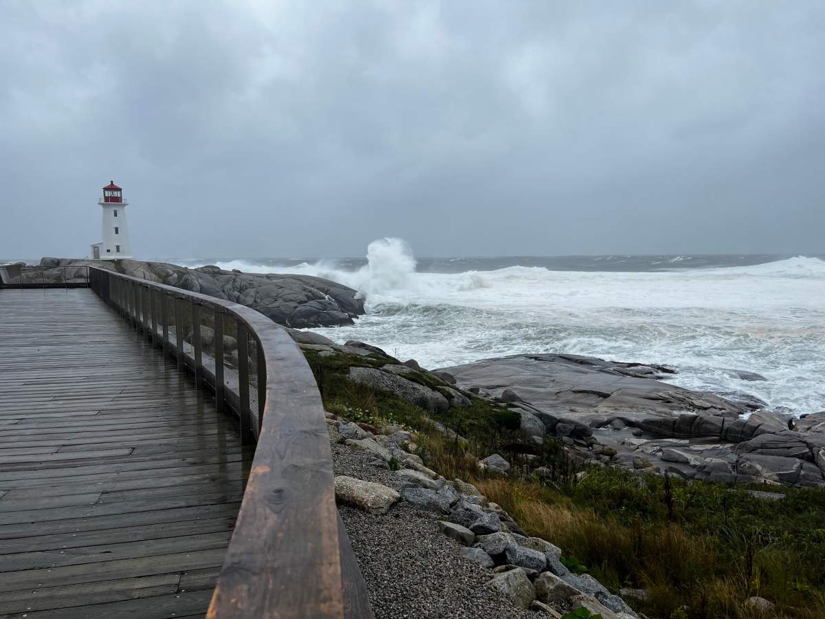 Waves crash along the shorline of Peggy’s Cove on Saturday morning.