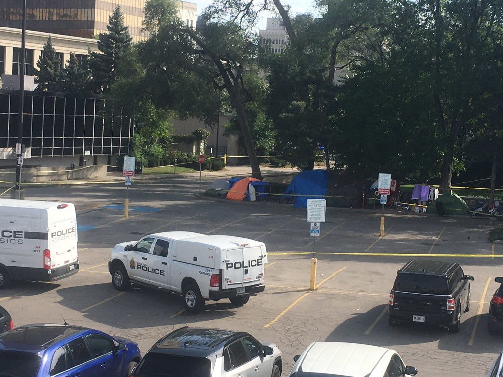 Hamilton police forensics teams on location at city hall amid a homicide investigation tied to the death of a man early on Sept. 27, 2023.