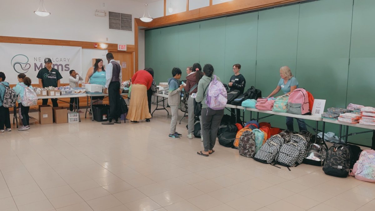 Financial crunch hits home Northeast Calgary parents flock to backto