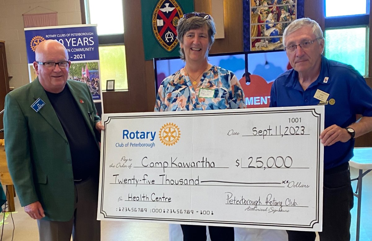 The Rotary Club of Peterborough has committed $100,000 to Camp Kawartha to support a new health centre. Taking part in the presentation on Sept. 11 are, from left, Rotarian Jim Coyle, Camp Kawartha philanthropy coordinator Susan Ramey, and Rotarian Ken Seim.