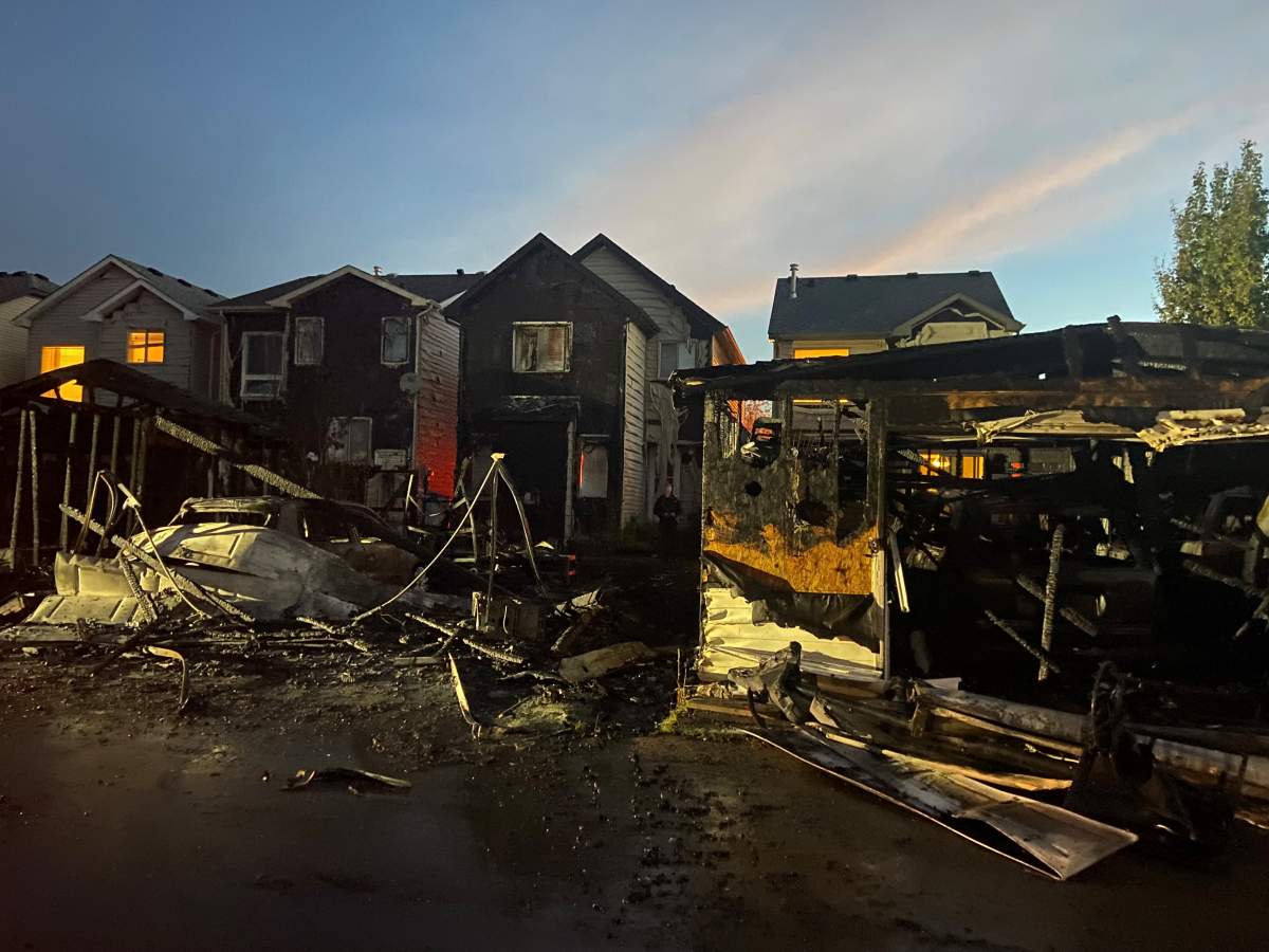 Four garages and three homes suffered damage from a fire in southeast Calgary, the Calgary Fire Department said.