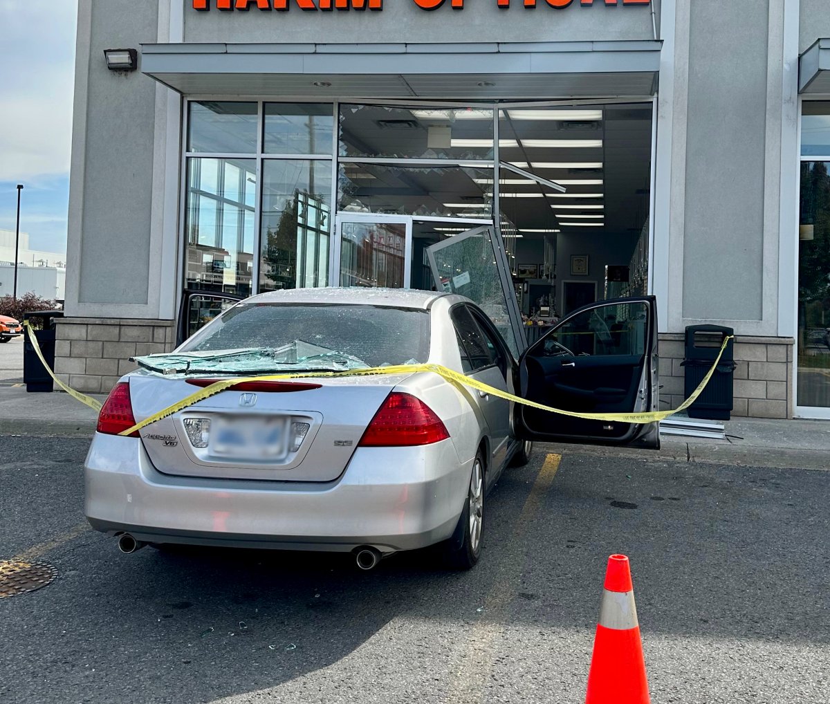 A car crashed through the front window of Hakim Optical on Lansdowne Street in Peterborough, Ont., on Sept. 28, 2023.
