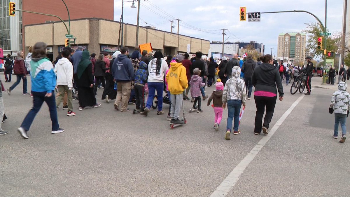 Protesters and counter protesters alike walked the streets of Saskatoon Wednesday.