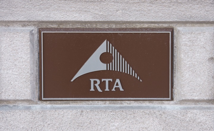 Corporate logo of Rio Tinto Alcan on the front of their Montreal offices. 
