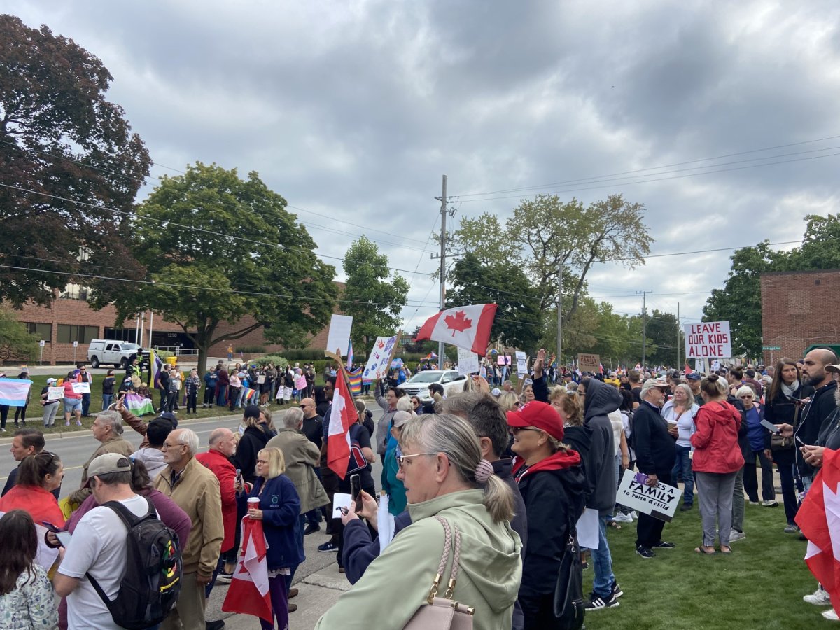 Protestors and counter-protestors in London, Ont., on Sept. 20, 2023.