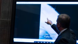 Deputy Director of Naval Intelligence Scott Bray points to a video display of a UAP during a hearing of the House Intelligence, Counterterrorism, Counterintelligence, and Counterproliferation Subcommittee hearing on 