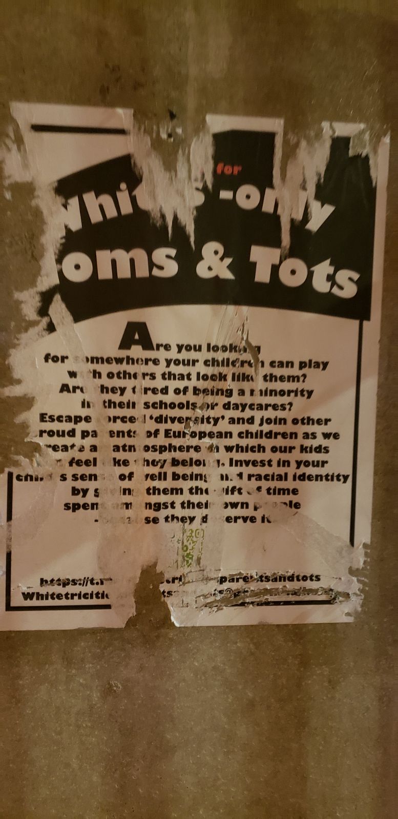 The poster, seen at a SkyTrain station in Coquitlam, had been partially ripped.