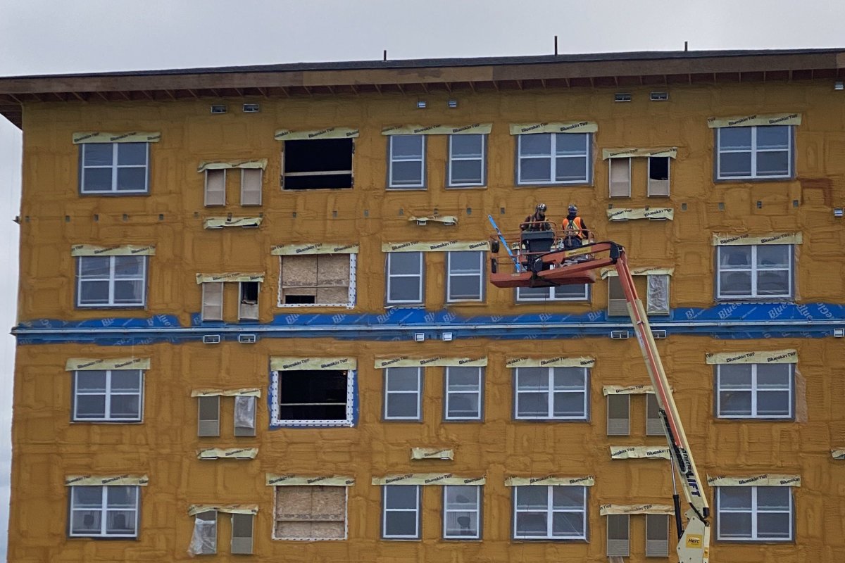 Workers constructing a supportive housing unit at 10 Shelldale Cres. in Guelph.