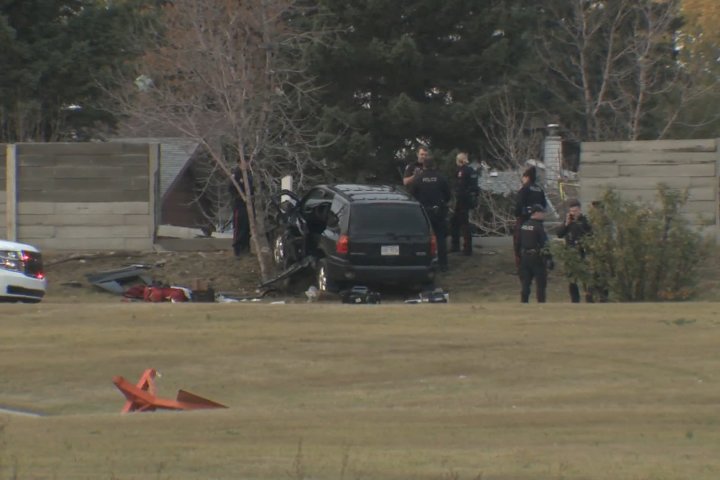 Calgary shooting victim taken to hospital after SUV crashes through wall along 16th Avenue