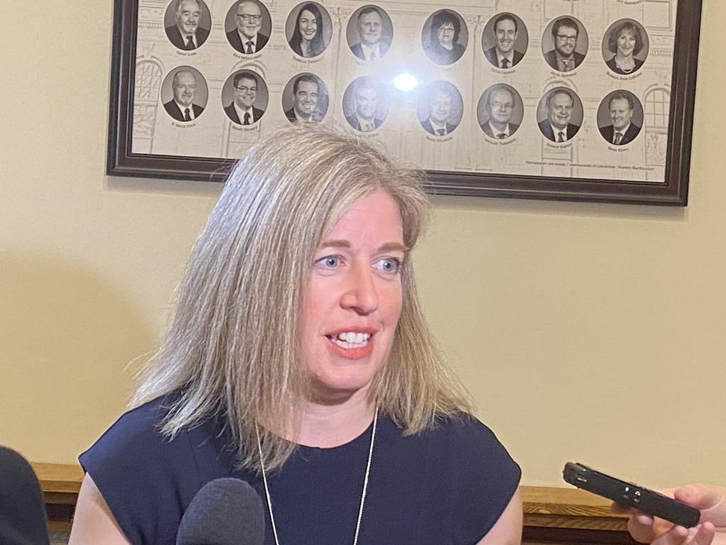 New Brunswick Liberal Leader Susan Holt talks to reporters at the legislature in Fredericton, N.B., on June 13, 2023. 