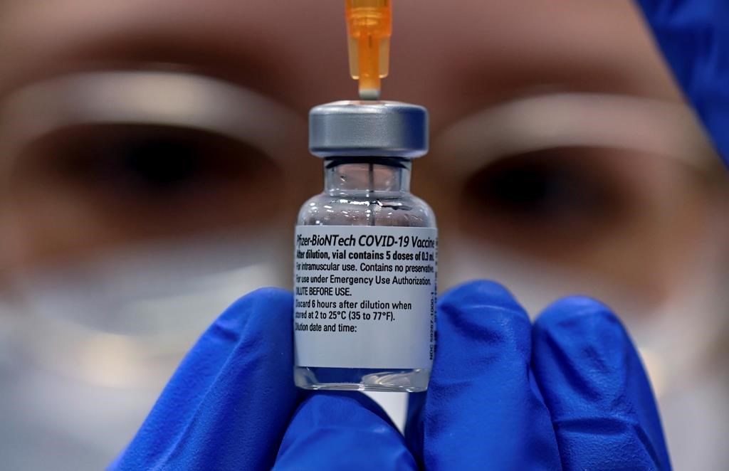 FILE - A COVID-19 vaccine at a vaccination centre in Halle, Germany. According to Saskatchewan’s latest report, COVID-19 and influenza infections are low but on the rise.(Hendrik Schmidt/dpa via AP, File).
