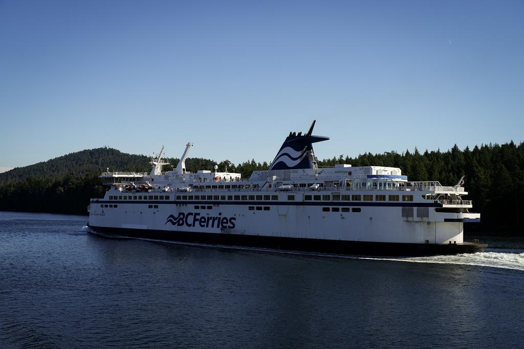 The BC Ferries vessel Spirit of Vancouver Island passes between Mayne Island and Galiano Island while travelling from Swartz Bay to Tsawwassen, B.C., on Wednesday, September 20, 2023. 