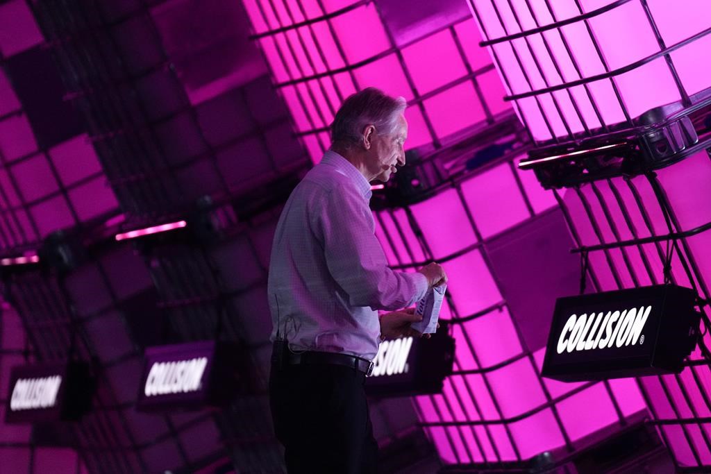 Geoffrey Hinton, known as the "Godfather of AI," leaves the stage after speaking at the Collision conference in Toronto on Wednesday, June 28, 2023.