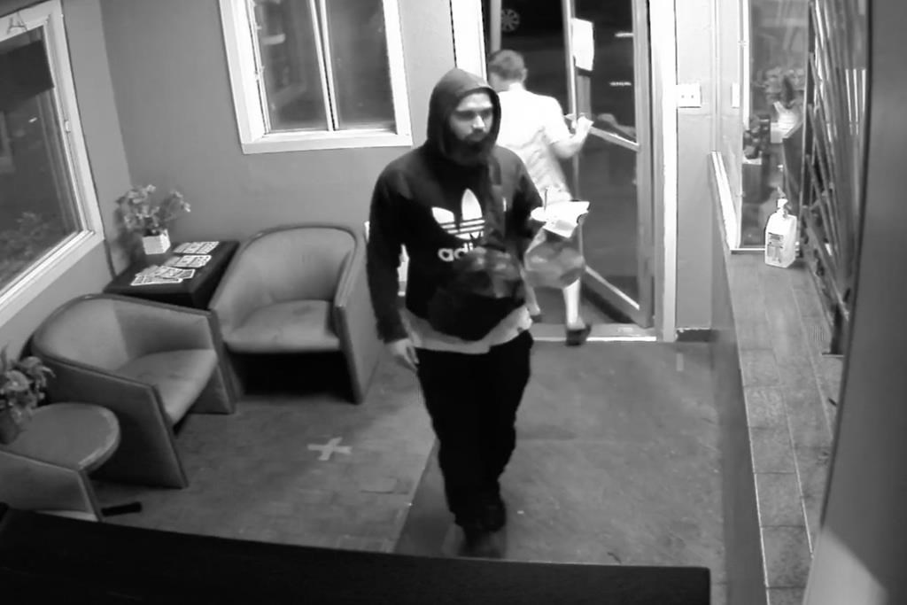 Abdulla Shaikh is seen in a capture taken from surveillance video at a Montreal motel submitted into evidence at a coroner's inquiry being heard in Montreal. Coroner Géhane Kamel will oversee the inquiry into the killings of André Lemieux, Mohamed Belhaj, Alex Lévis Crevier and the police killing of the 26-year-old suspect, Abdulla Shaikh. 
