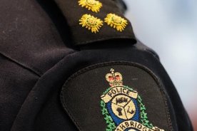 A southern Alberta school division is looking into what conditions may have contributed to four members of a high-school football team being charged with the sexual assault of a teammate. A Lethbridge police arm badge is pictured in Lethbridge, Alta., on Wednesday, March 10, 2021.