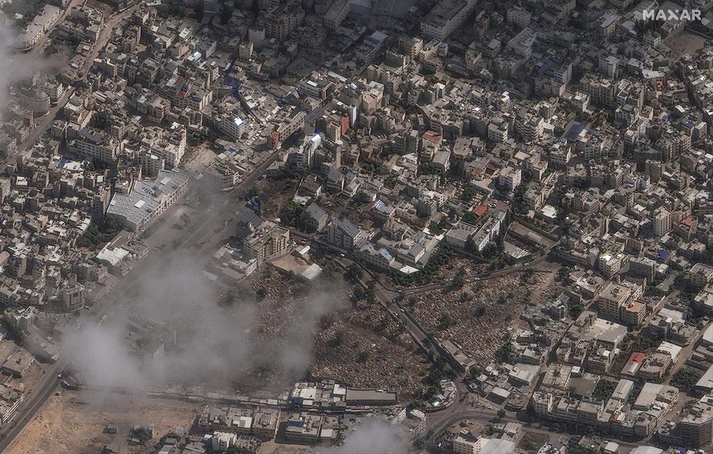 This image provided by Maxar Technologies on Wednesday, Oct. 18, 2023 shows an overview of al-Ahli Hospital after explosion in Gaza City. (Satellite image ©2023 Maxar Technologies via AP).
