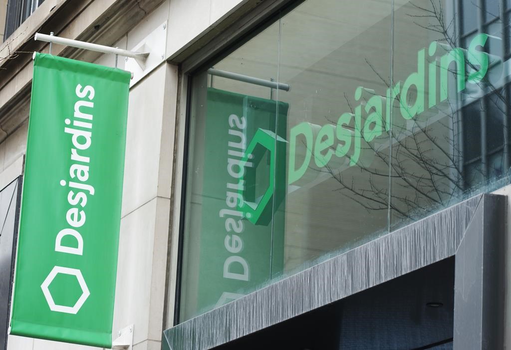 A Caisse Desjardins branch is seen, Wednesday, February 24, 2021 in Montreal. Desjardins says it is cutting close to 400 jobs as it responds to economic uncertainty.THE CANADIAN PRESS/Ryan Remiorz.