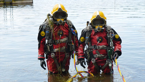 A photo of two surface divers.