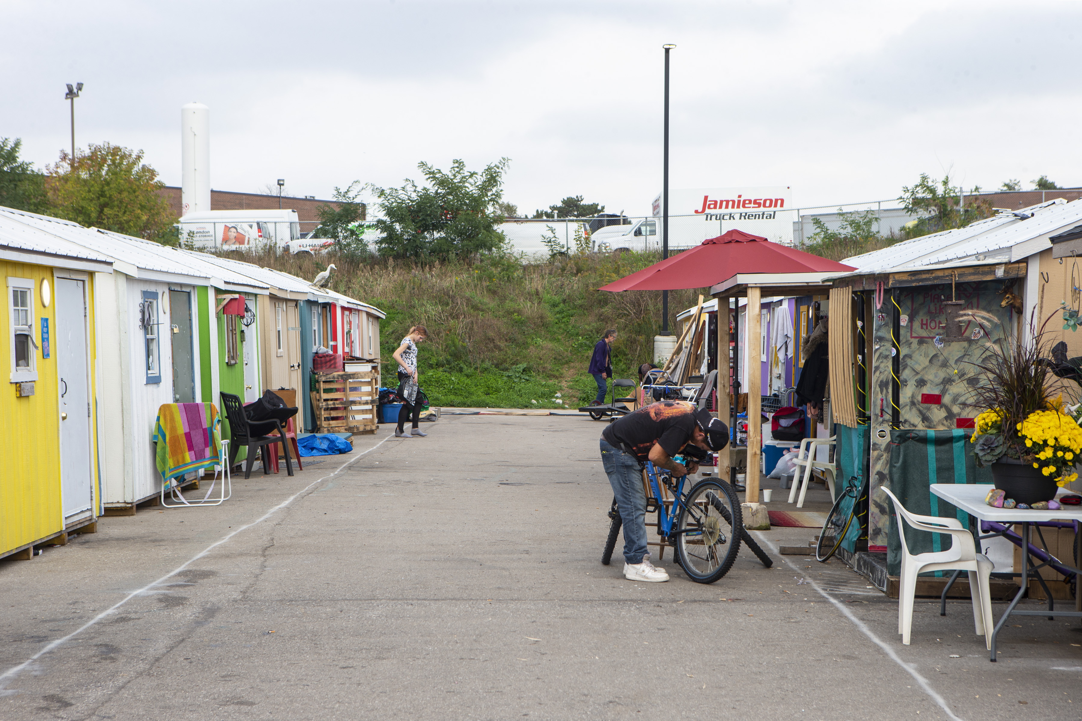 A general view of the “A Better Tent City” community In Kitchener, Ontario, on Thursday October 14, 2021. The community provides small cabins set up as an alternative to the homeless shelter system in the area. THE CANADIAN PRESS/Chris Young