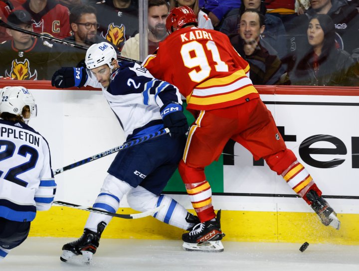 Flames rally from 3-1 deficit to ground Jets 5-4 in pre-season play