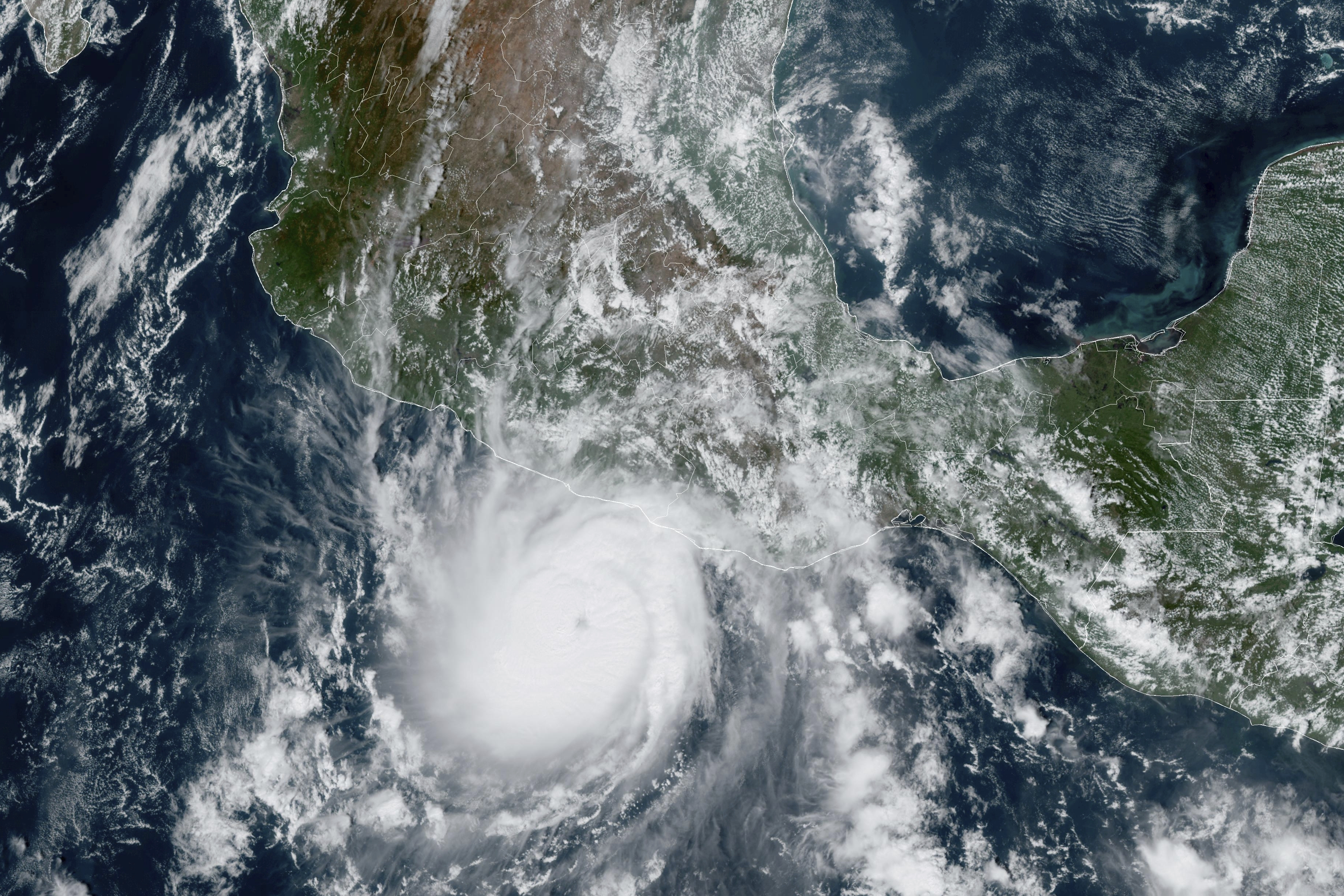 This satellite image provided by NOAA on Tuesday, Oct. 24, 2023, shows Hurricane Otis approaching Mexico's Pacific coast near Acapulco. Otis is forecast to make landfall early Wednesday and there is a hurricane warning in effect from Punta Maldonado to Zihuatanejo.