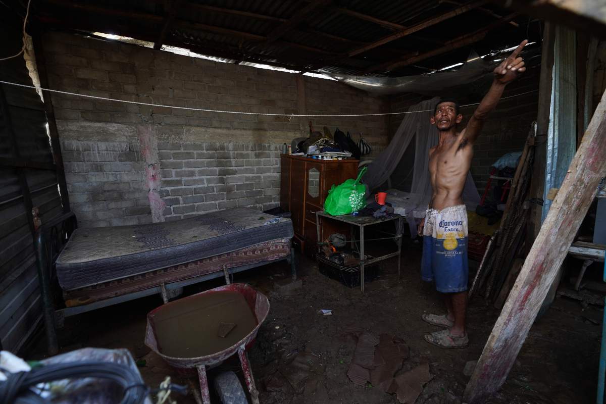 Camilo Alvarez shows what is left of his home in the wake of Hurricane Otis in Acapulco, Mexico, on Thursday.
