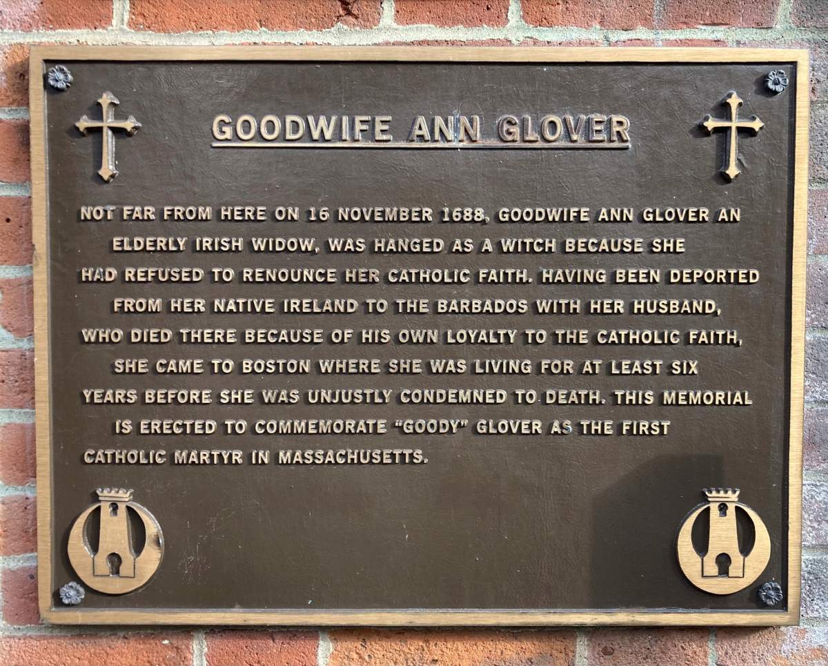 This Oct. 25, 2023 photo shows a plaque memorializing Goodwife Ann Glover or Goody Glover, hanged as a witch in Boston in 1688, is located on the front of a Catholic church in the city's North End neighborhood. It's one of the reminders of a dark period in the city's history.