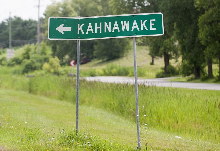 A sign for the Kahnawake Mohawk reserve is shown near Montreal, Wednesday, July 21, 2010. Peacekeepers responded to reports of a possible drowning on Sunday, Oct. 1, at the old Bédard Quarry.