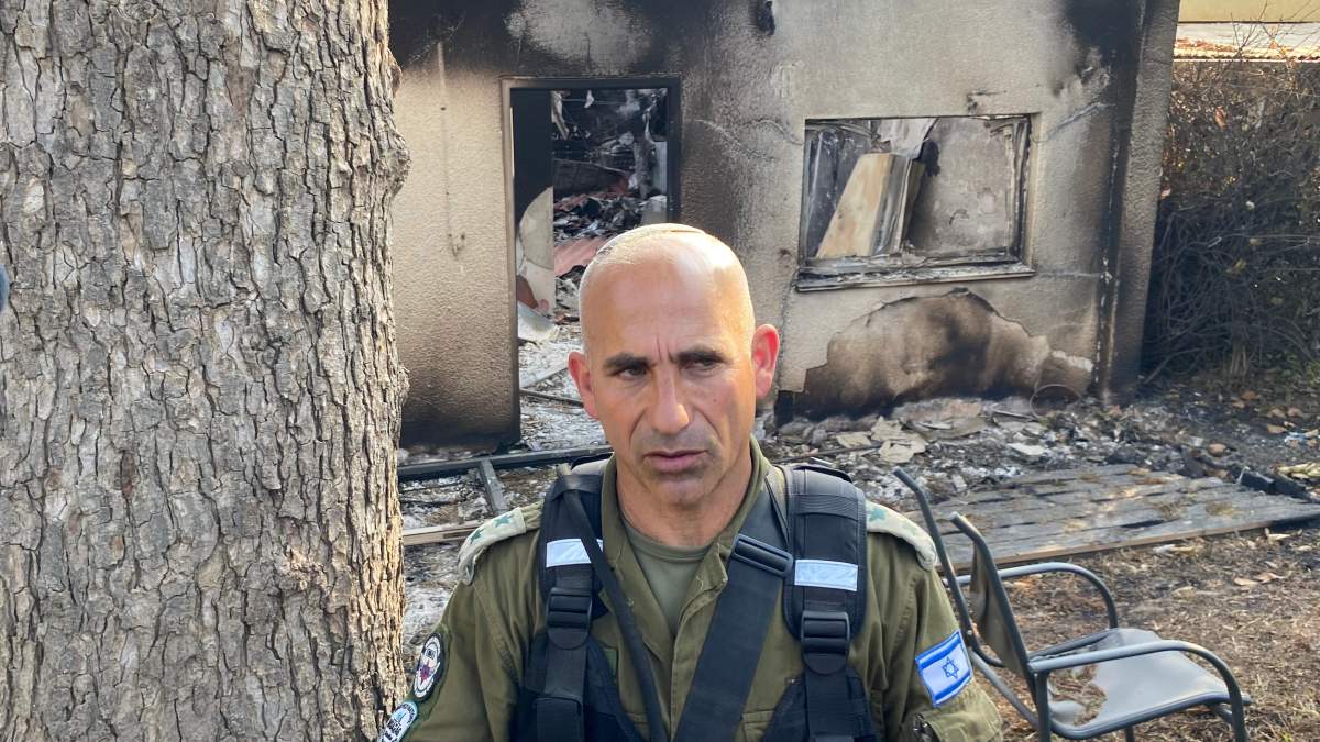 Israeli Col. Golan Vach outside the house in Kibbutz Be'eri where he found a mother and baby shot dead.