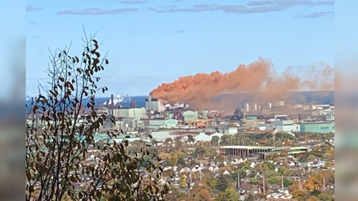 A photo from a social media post of a rust-coloured plume over ArcelorMittal Dofasco Saturday Oct. 28, 2023.

