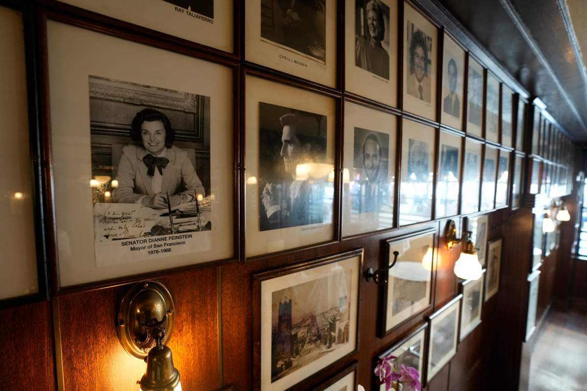 A photo of the late U.S. Sen. Dianne Feinstein hangs at John’s Grill in San Francisco, Wednesday, Oct. 4, 2023. The restaurant, which celebrated its 115th anniversary Wednesday with a free lunch and appearances by San Francisco Mayor London Breed and other politicians, paid tribute to Sen. Feinstein who died last week.