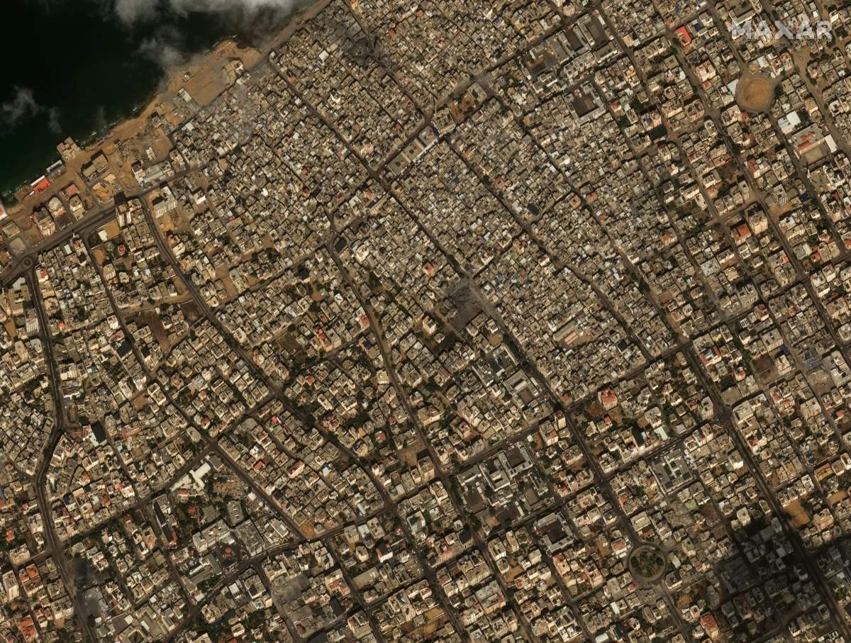 Satellite imagery overview of Israeli airstrikes in the Rimal district, a neighborhood in Gaza City located 3 kilometers from the city center. (Satellite image ©2023 Maxar Technologies via AP)