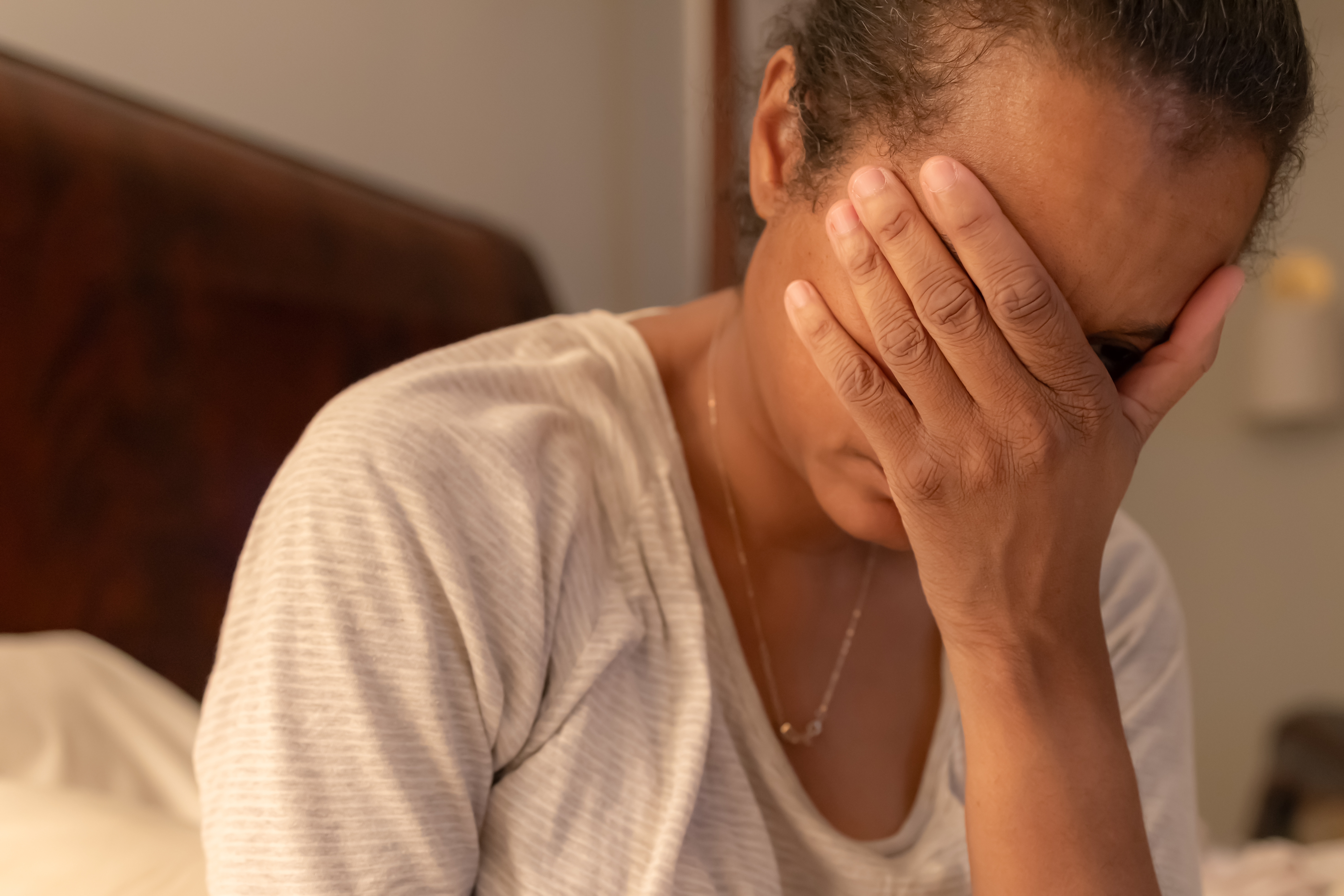 black woman experiences depression or pain