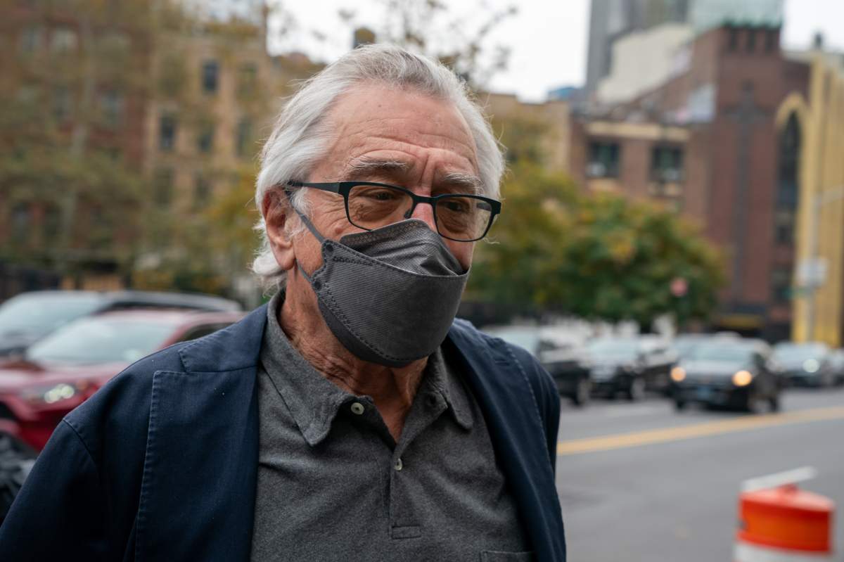 Robert De Niro. He is wearing a mask.