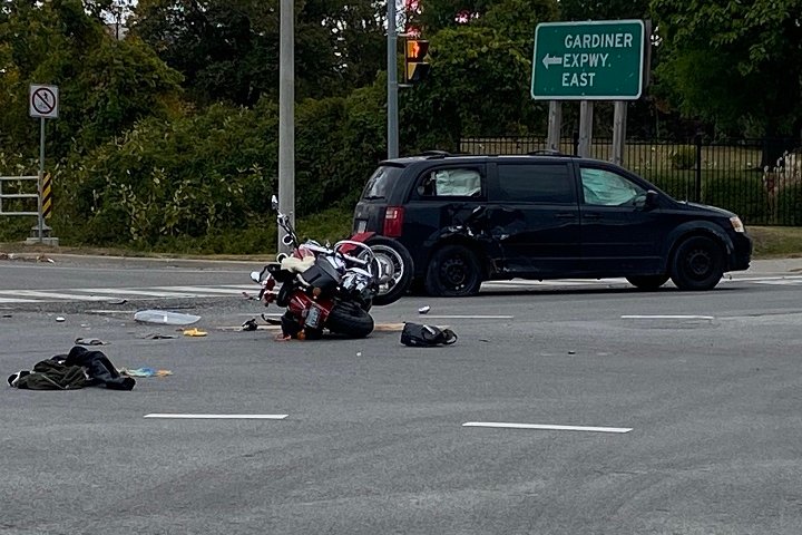 Woman in 50s seriously injured after crash involving motorcycle, van in Toronto