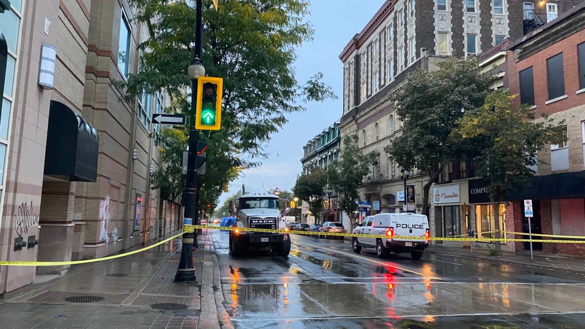 Hamilton police on scene at James Street North and York Boulevard on Sept. 28, 2023. Collision investigators say a cyclist died after hit by a truck near the intersection.