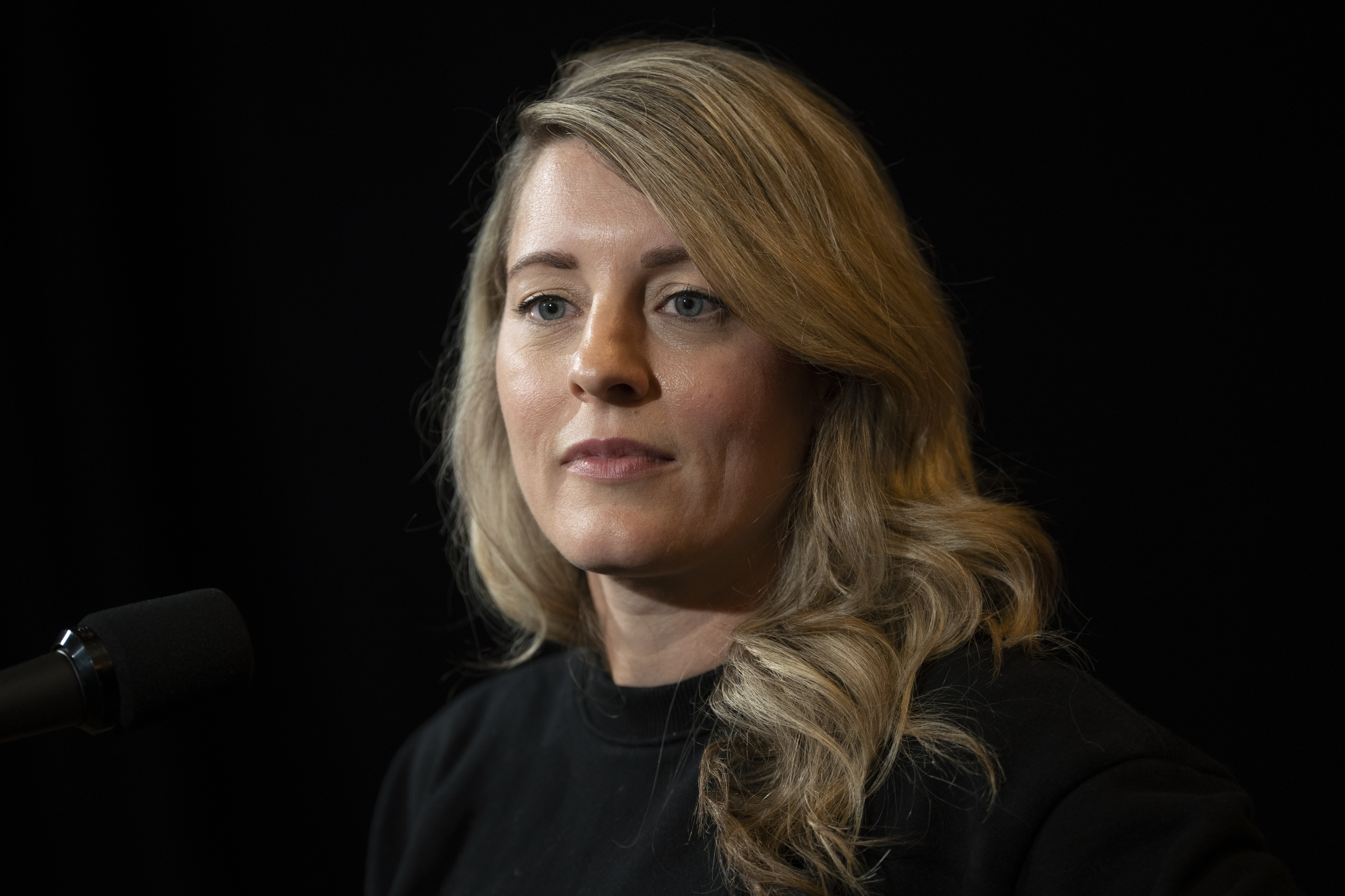 Melanie Joly, Minister of Foreign Affairs appears in front of a dark background